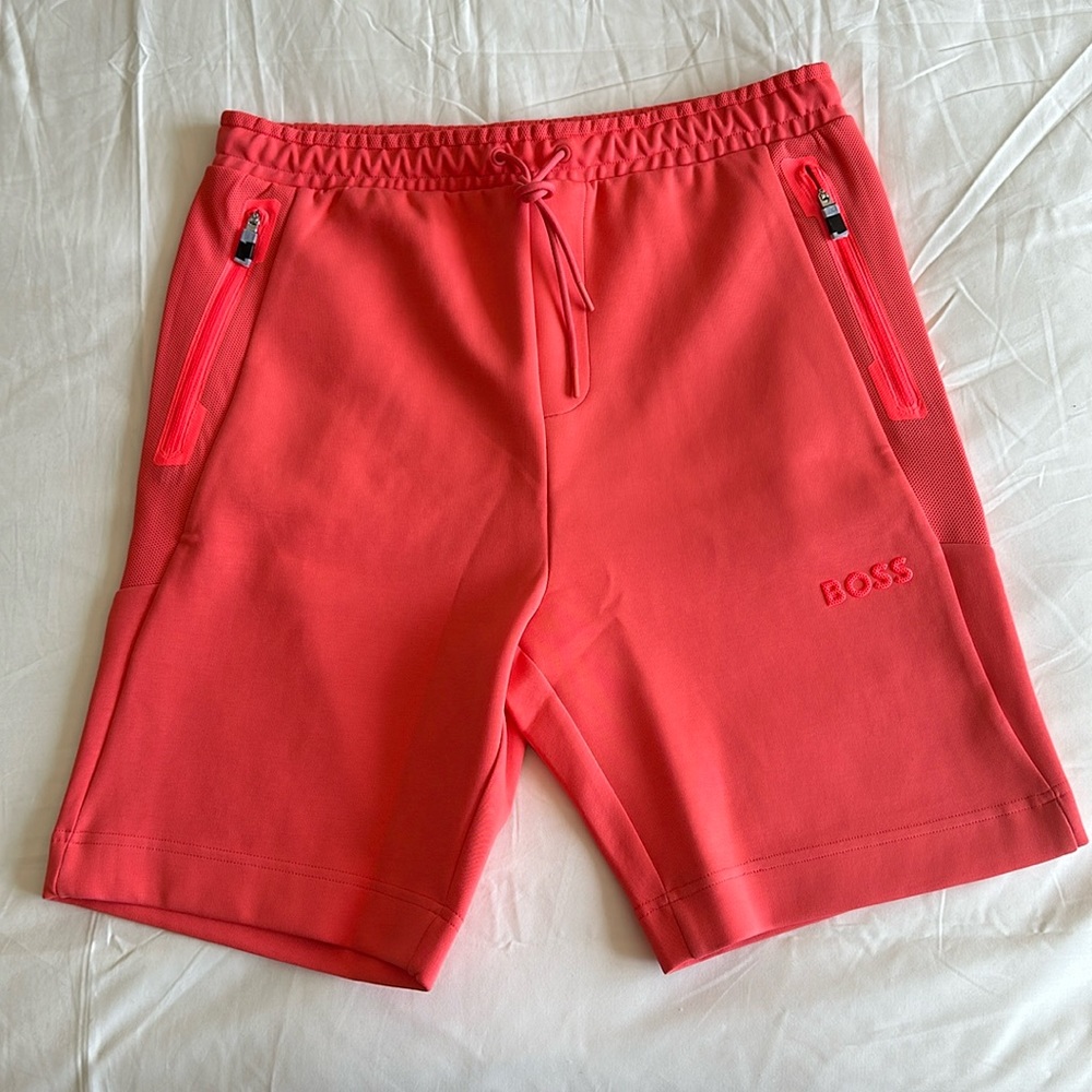 Brand new Boss shorts, red, size medium.